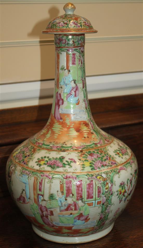 A  famille rose punch bowl and a similar bottle vase and cover